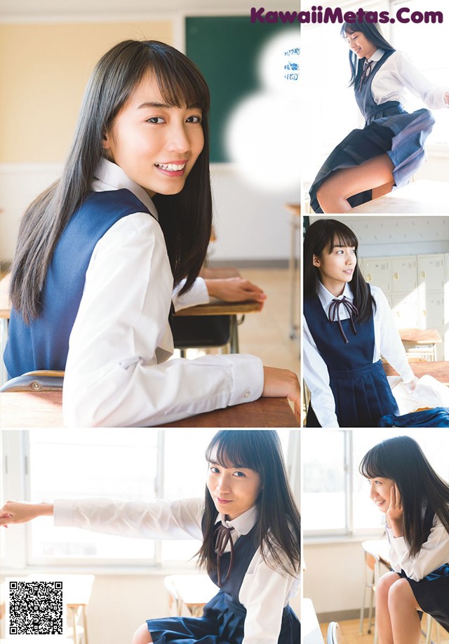 A young woman in a school uniform sitting at a desk.
